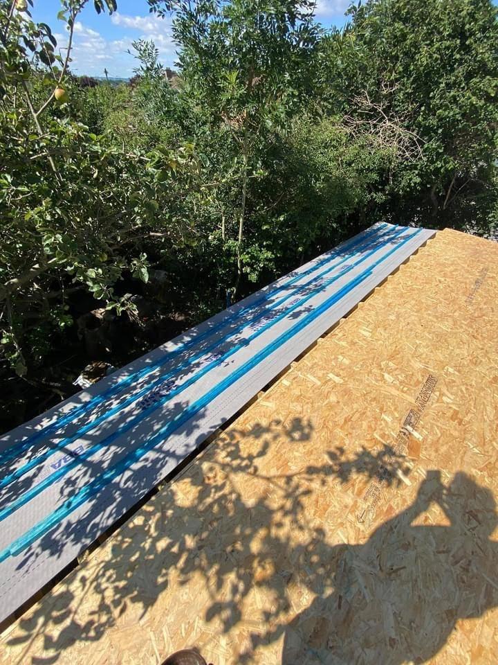 Insulation boards laid over new decking